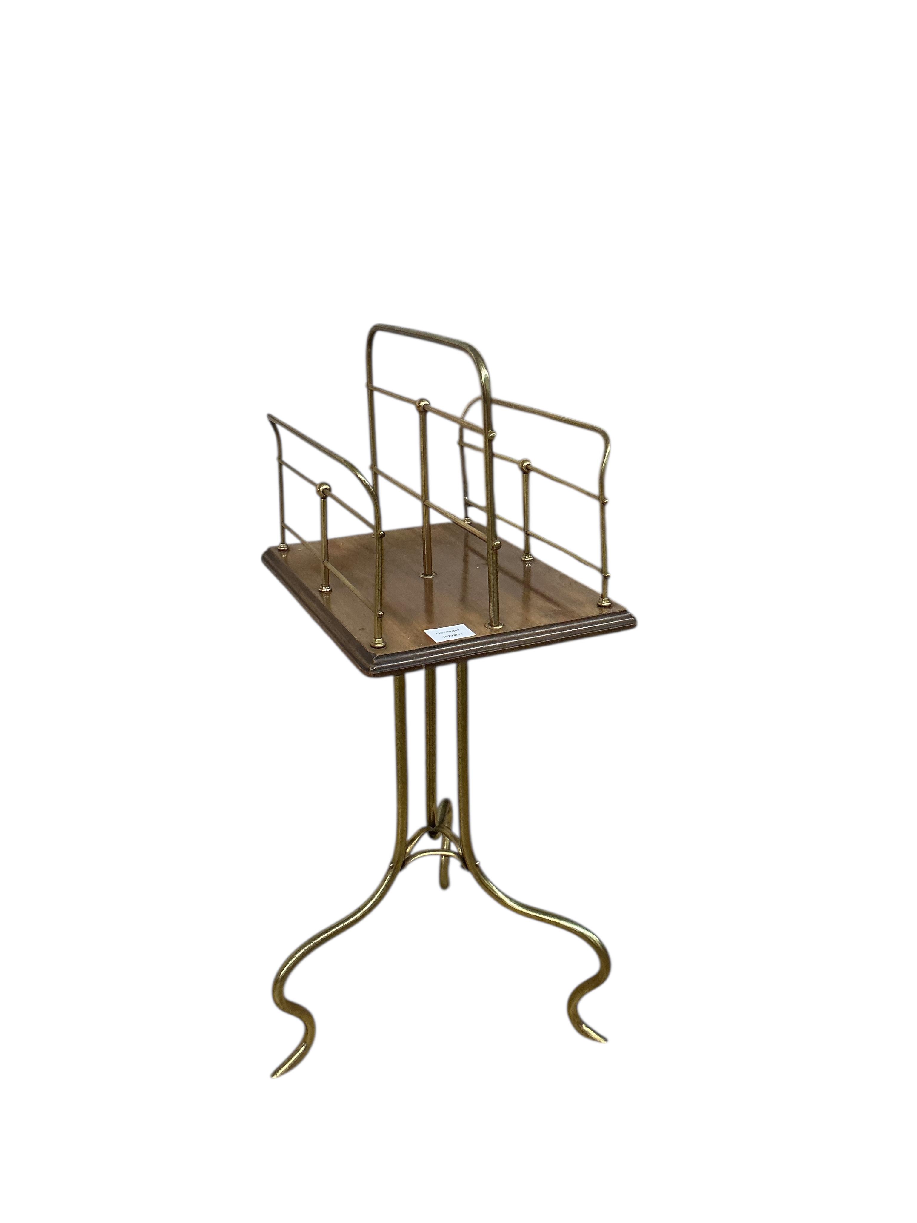 An Edwardian mahogany and tubular brass two division revolving magazine stand, width 40cm, depth 28cm, height 82cm